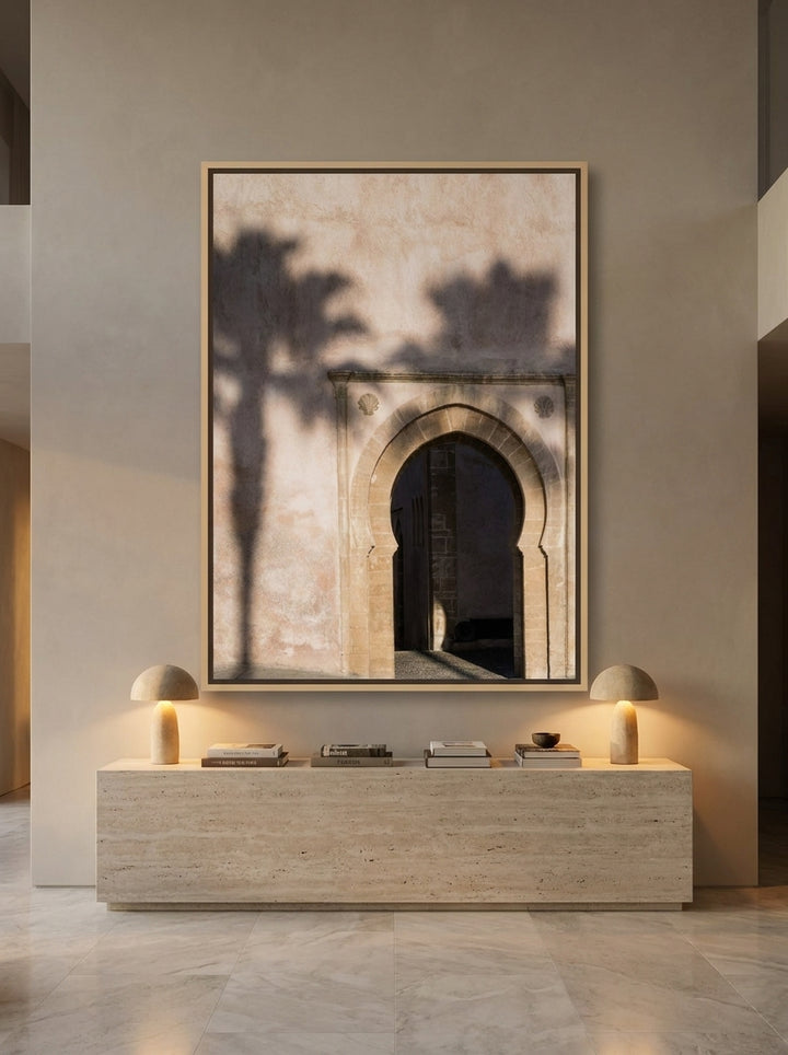 Oversized statement canvas wall art with a natural timber surround styled on the wall in a luxe living room