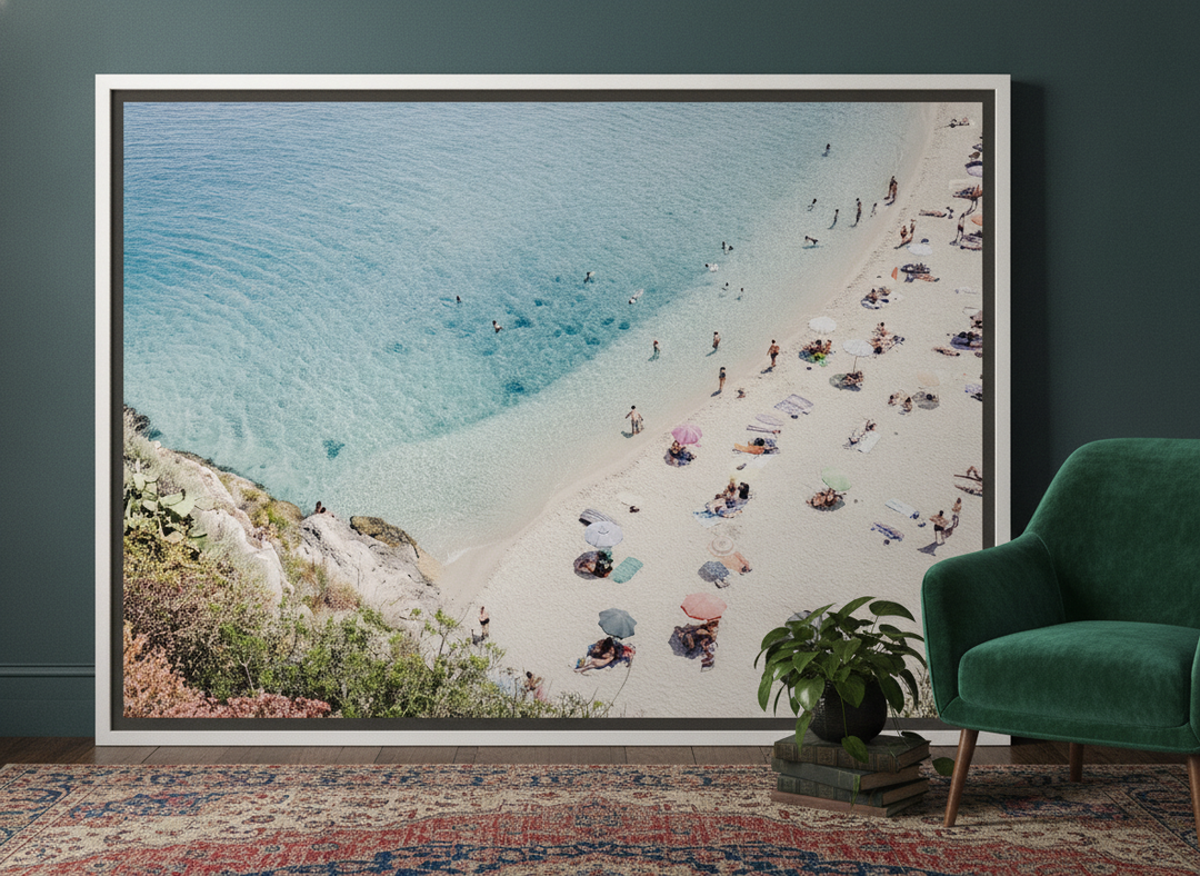 Canvas wall art with a white surround leaning against the wall in a moody bedroom