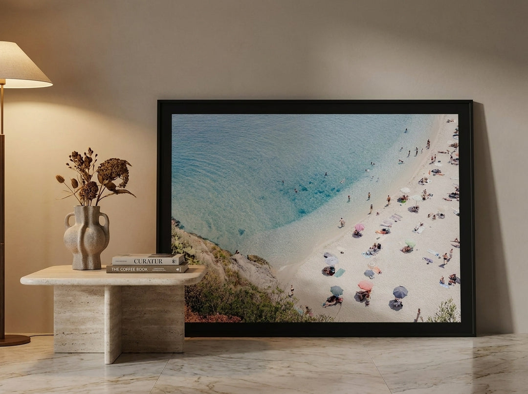 Oversized statement modern wall art print leaning against the wall in a luxe living room