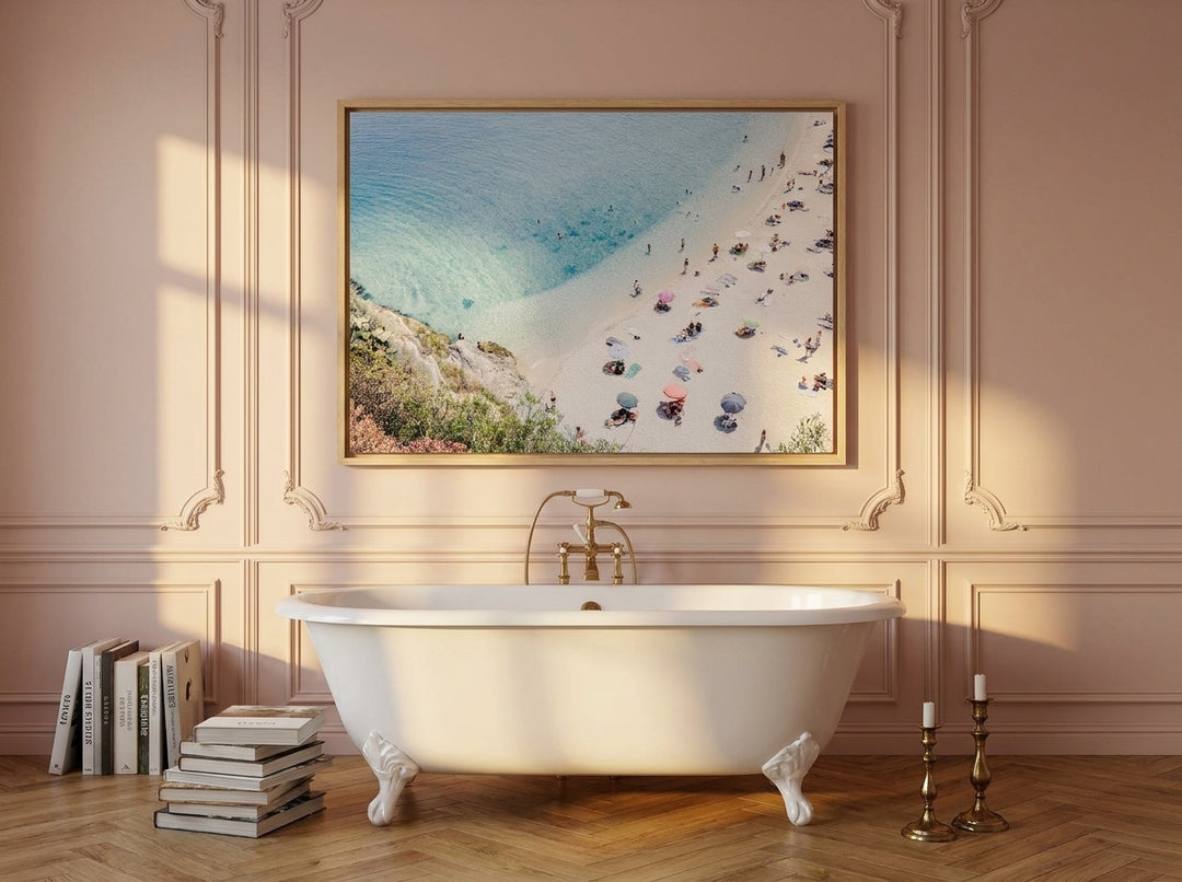 Canvas wall art with a natural timber surround styled on the wall in a Parisian bathroom