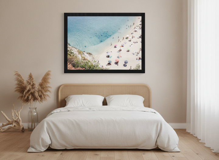 Oversized statement modern wall art print styled on the wall in a coastal bedroom