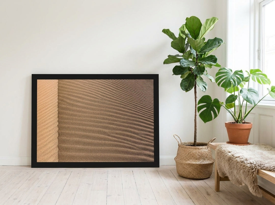 Modern wall art print leaning against the wall in a bright Scandinavian living room