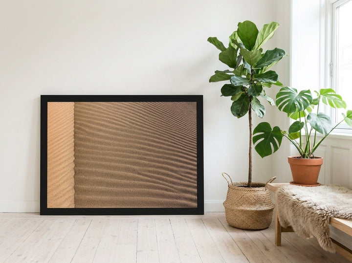 Modern wall art print leaning against the wall in a bright Scandinavian living room