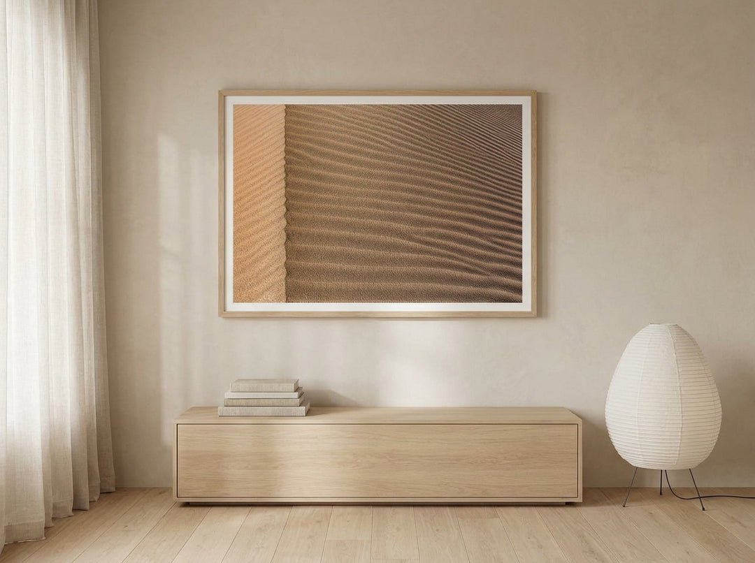 Modern wall art print styled on the wall in a warm Japandi living room