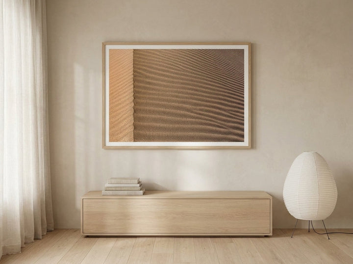 Modern wall art print styled on the wall in a warm Japandi living room