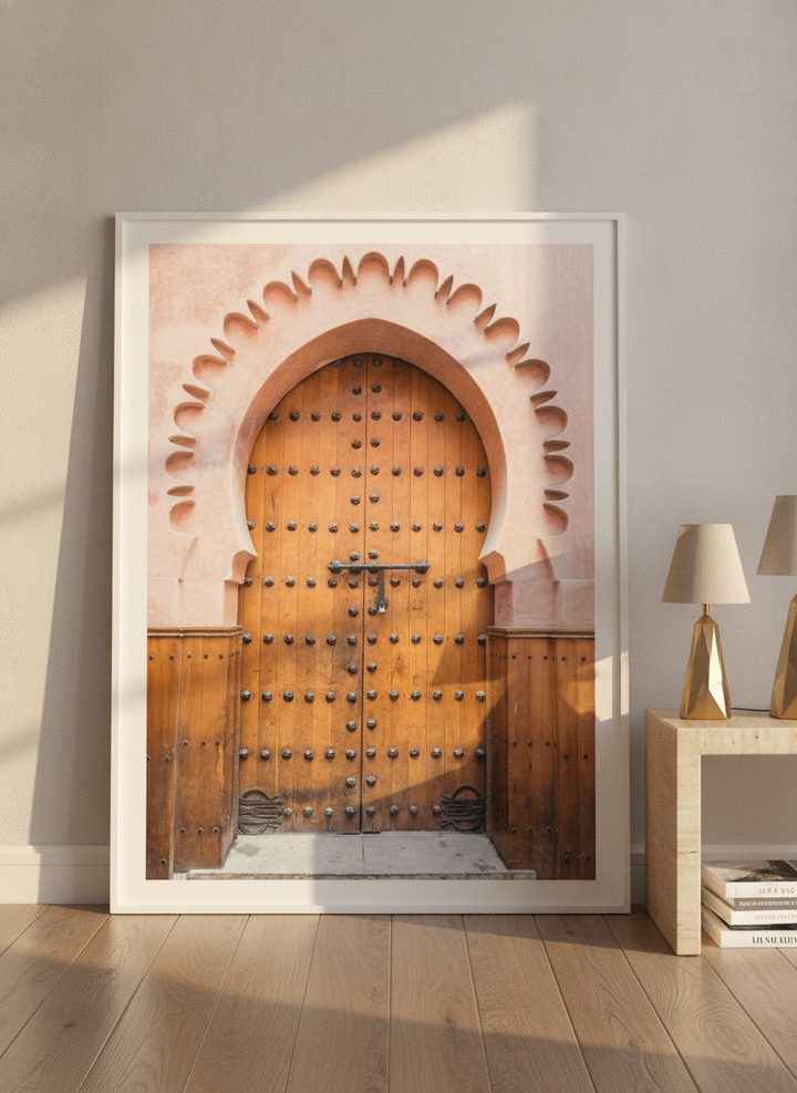 Oversized statement modern wall art print leaning against the wall in a luxe dining room