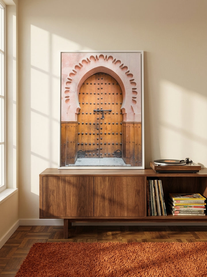 Canvas wall art with a white surround standing on a sideboard in a retro 70s living room