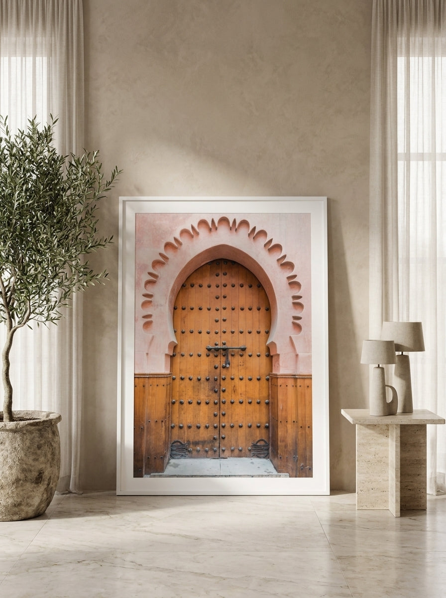 Oversized statement modern wall art print leaning against the wall in a luxe dining room