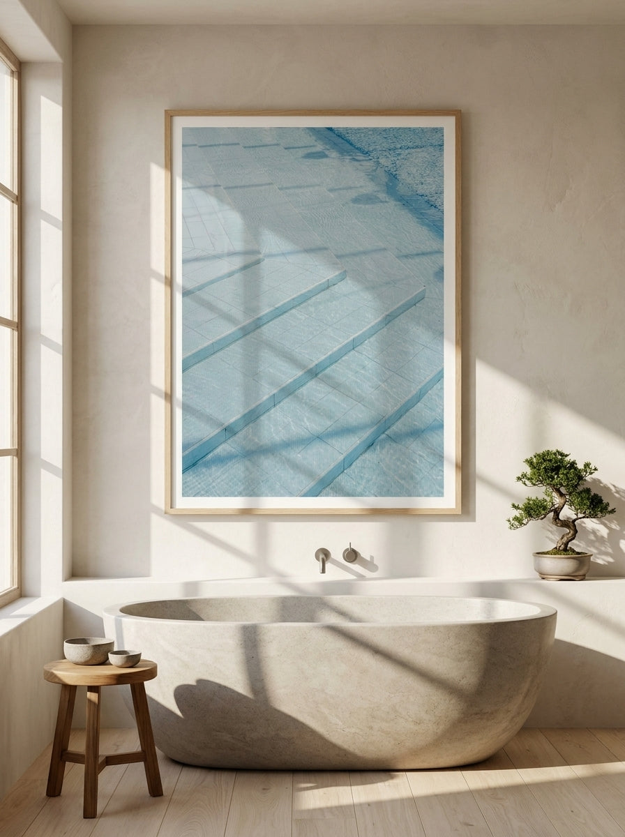 Modern wall art print styled on the wall in a warm Japandi bathroom