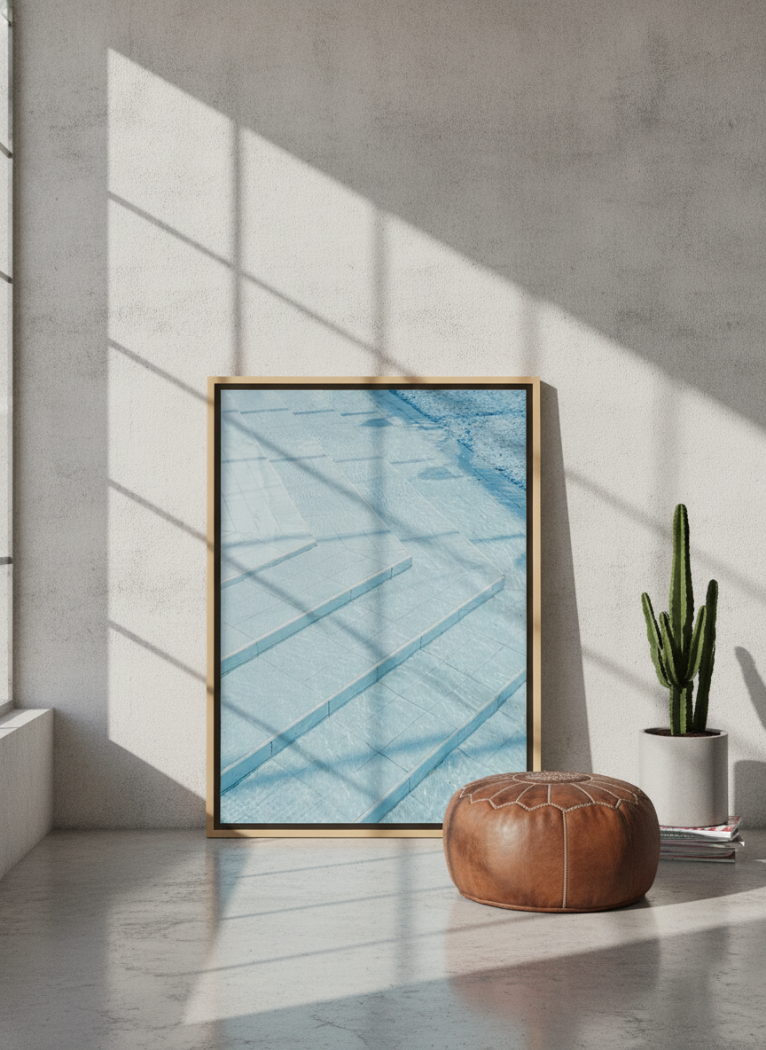 Canvas wall art with a natural timber surround leaning against the wall in an industrial loft bedroom