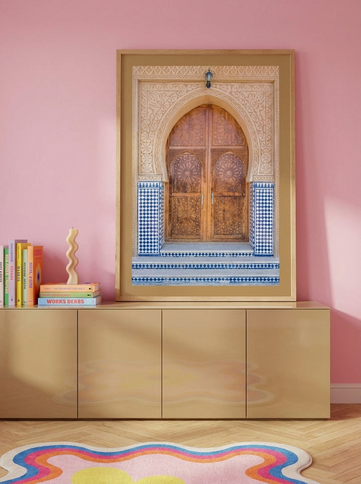 Modern wall art print standing on a sideboard in a colourful eclectic dining room