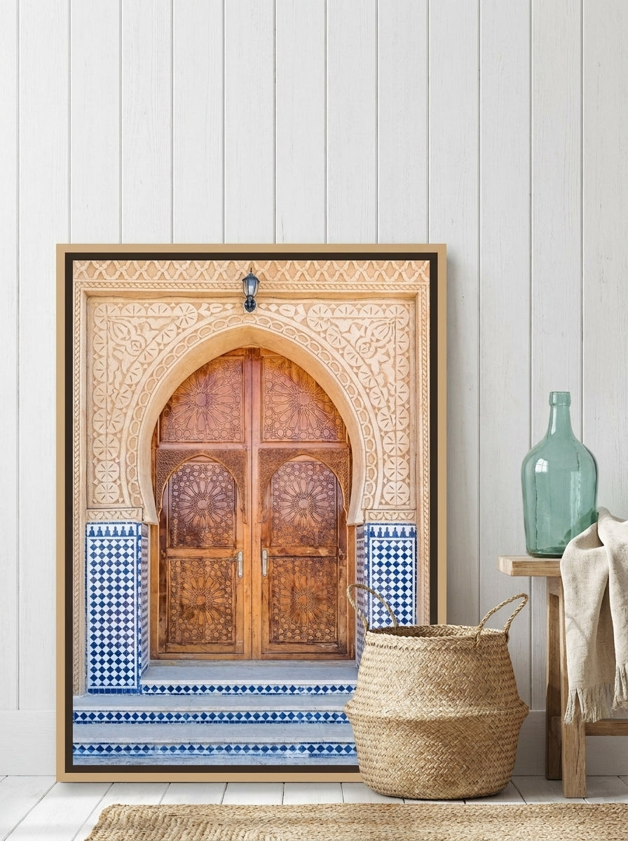 Canvas wall art with a natural timber surround leaning against the wall in a coastal home office