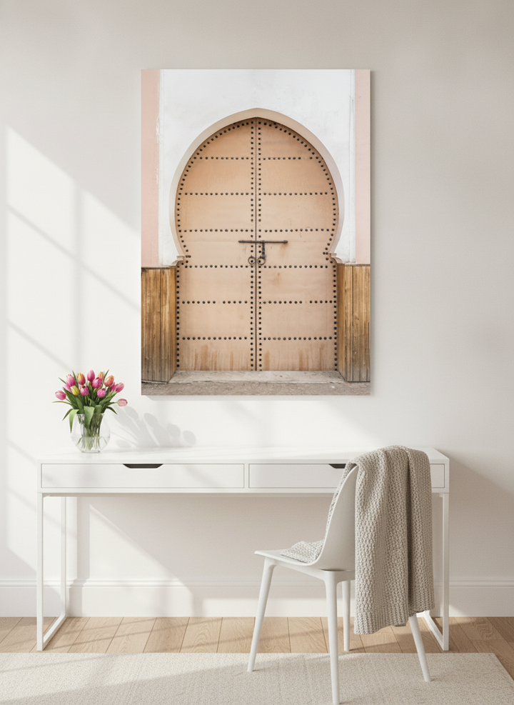 Stretched canvas wall art styled on the wall in a bright Scandinavian home office