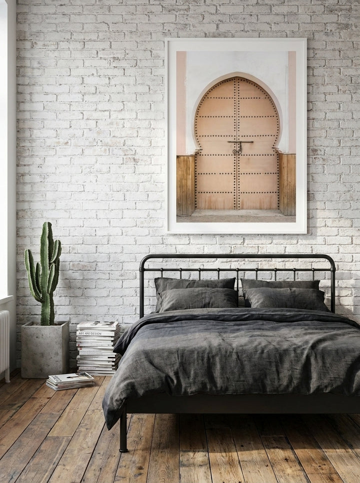 Modern wall art print styled on the wall in an industrial loft bedroom