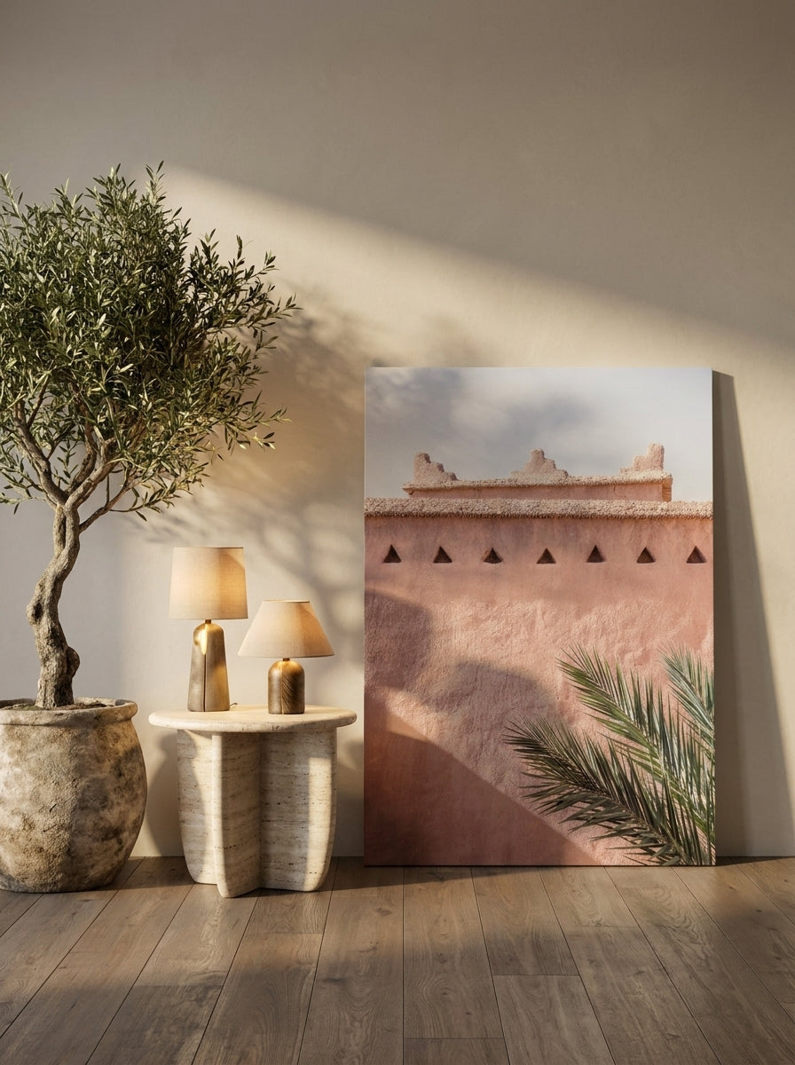 Stretched canvas wall art leaning against the wall in a luxe dining room