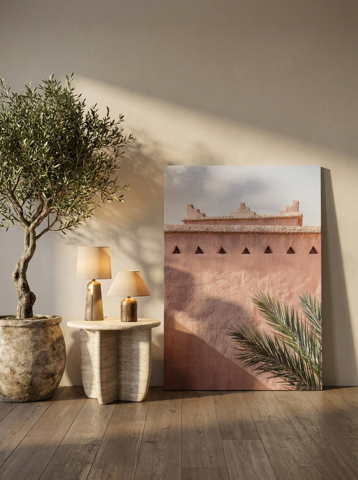 Stretched canvas wall art leaning against the wall in a luxe dining room