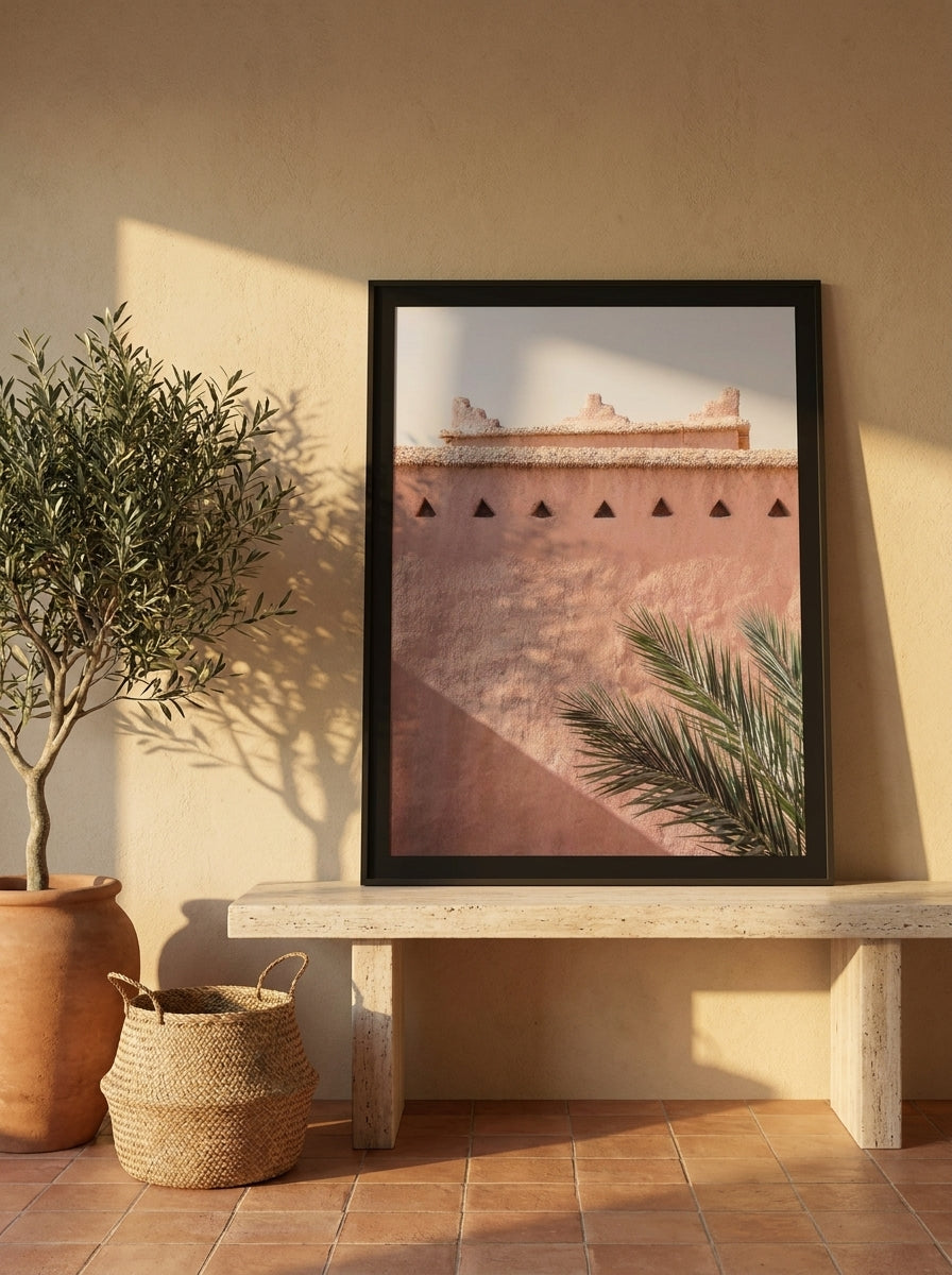 Modern wall art print standing on a console in a Mediterranean bedroom