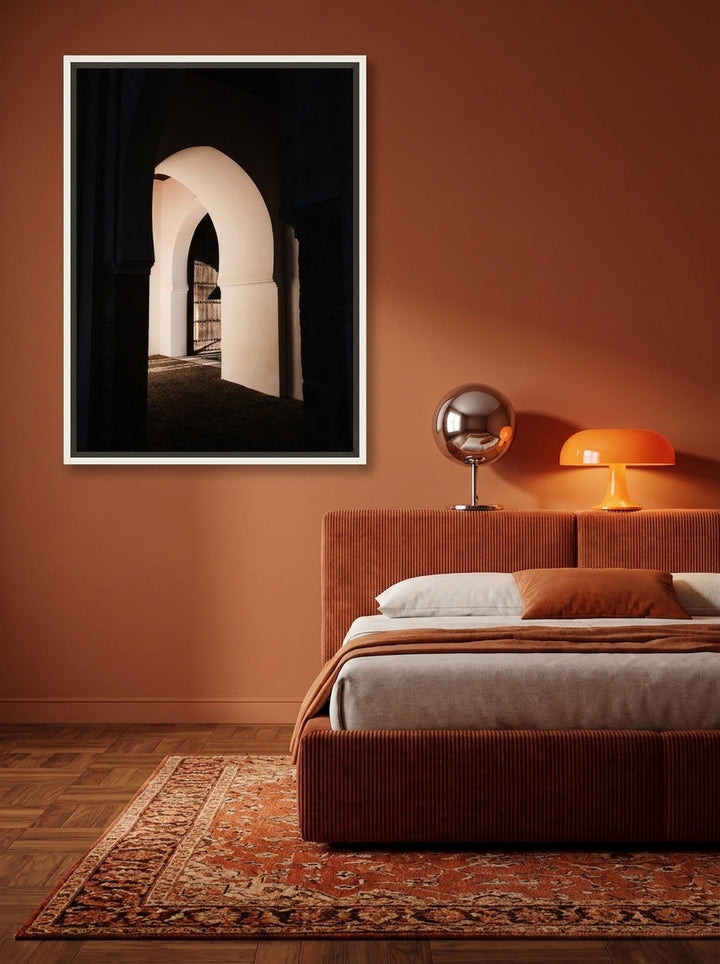 Canvas wall art with a white surround styled on the wall in a retro 70s bedroom