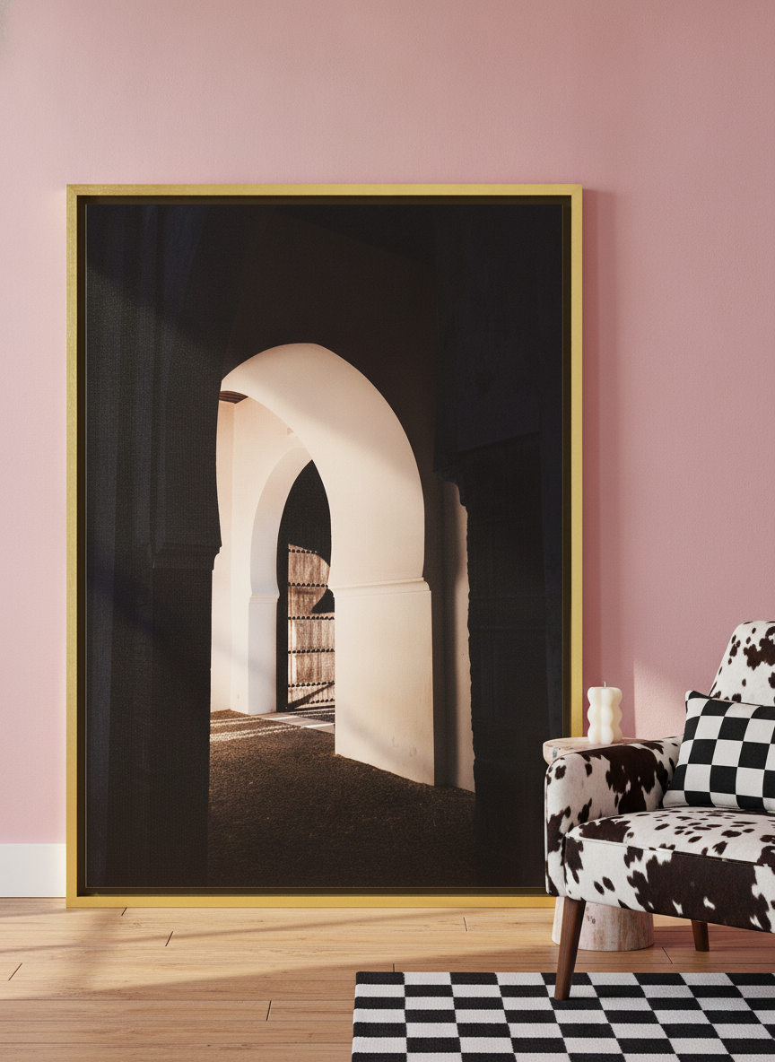 Canvas wall art with a gold leaf surround leaning against the wall in a colourful eclectic home office