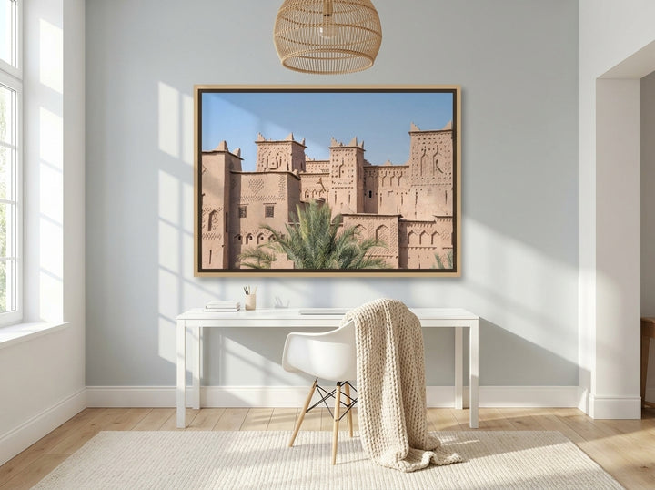Oversized statement canvas wall art with a natural timber surround styled on the wall in a bright Scandinavian home office