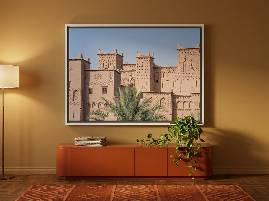 Oversized statement canvas wall art with a white surround styled on the wall in a retro 70s living room