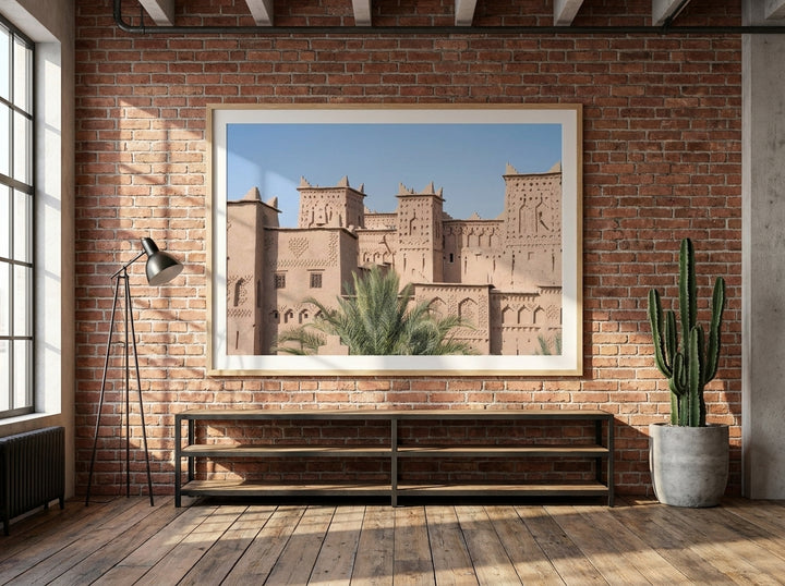 Oversized statement modern wall art print styled on the wall in an industrial loft living room
