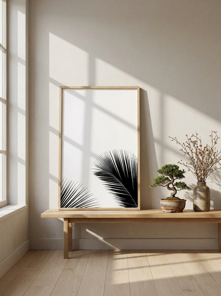 Modern wall art print standing on a bench in a warm Japandi home office