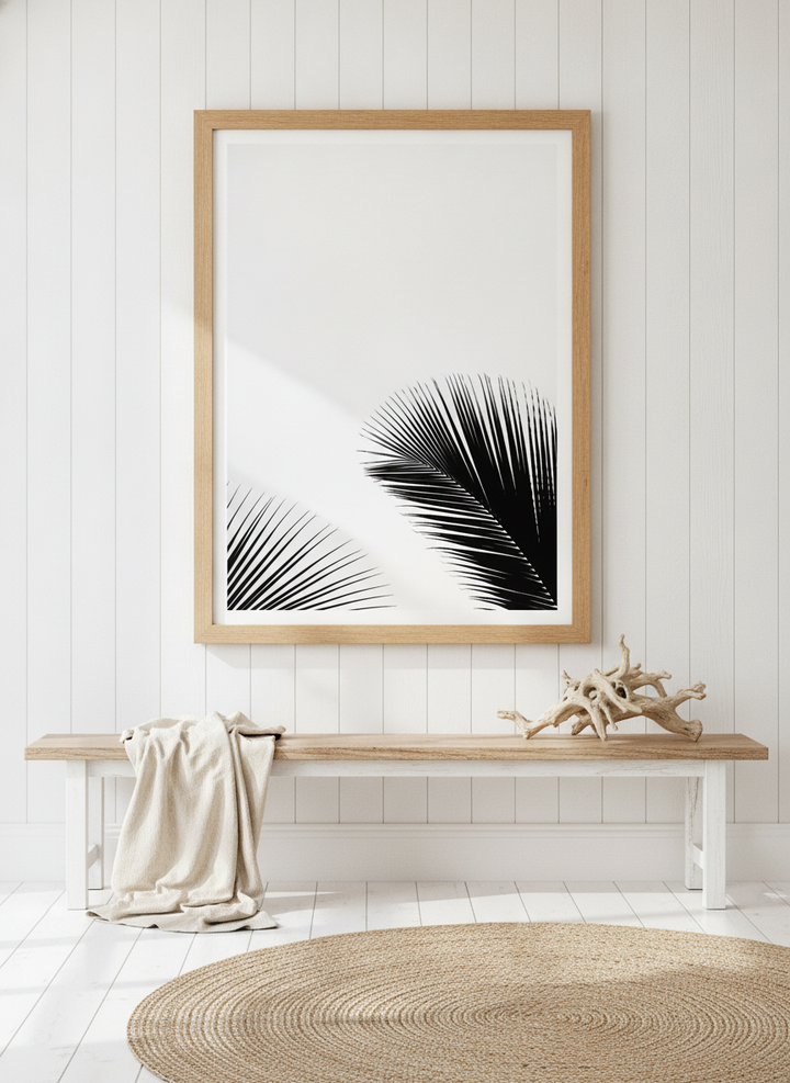 Modern wall art print styled on the wall in a coastal living room