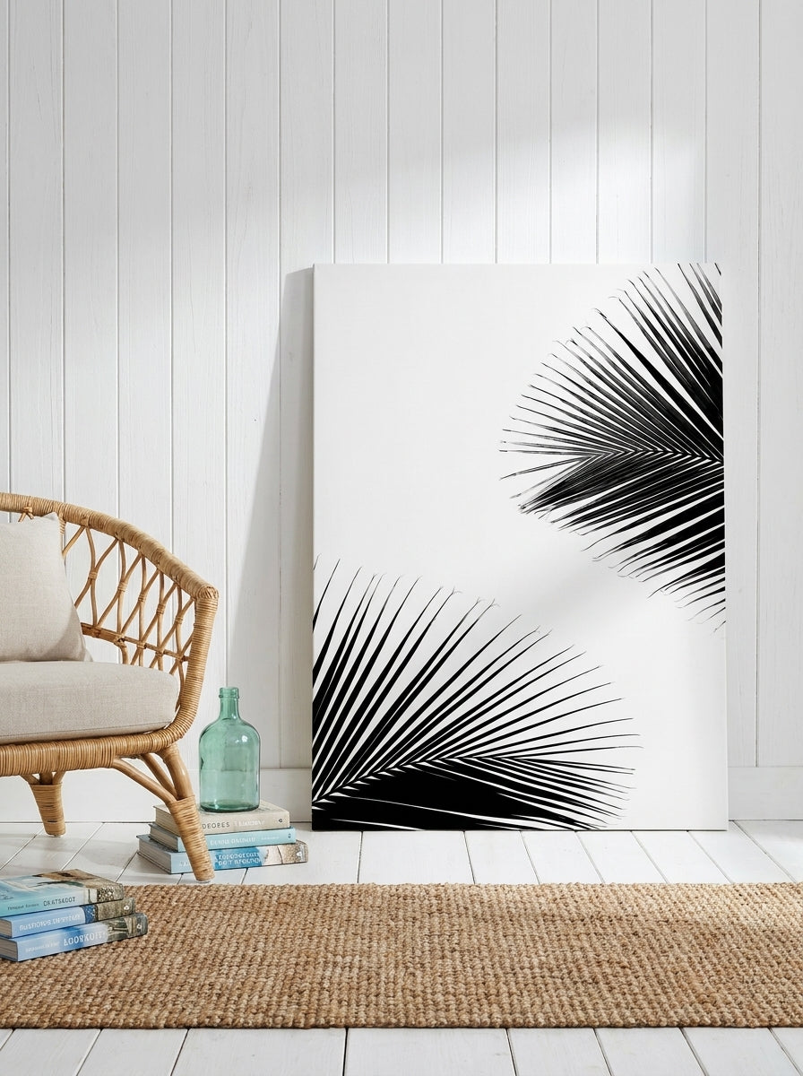 Stretched canvas wall art leaning against the wall in a coastal bedroom
