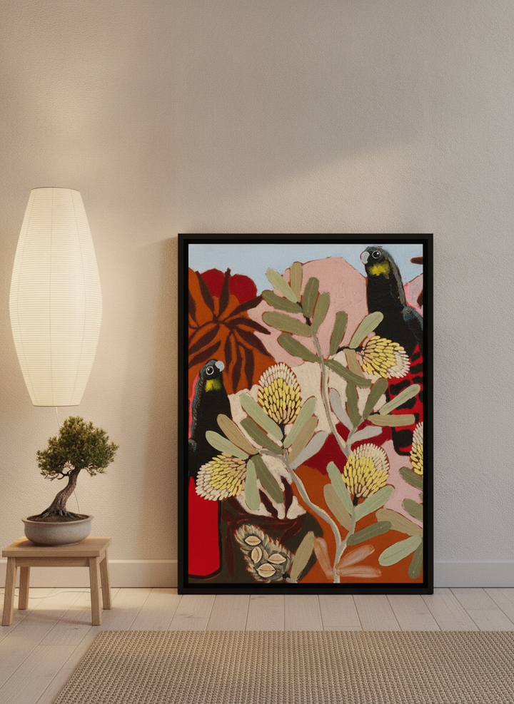 Canvas wall art with a black surround leaning against the wall in a warm Japandi living room