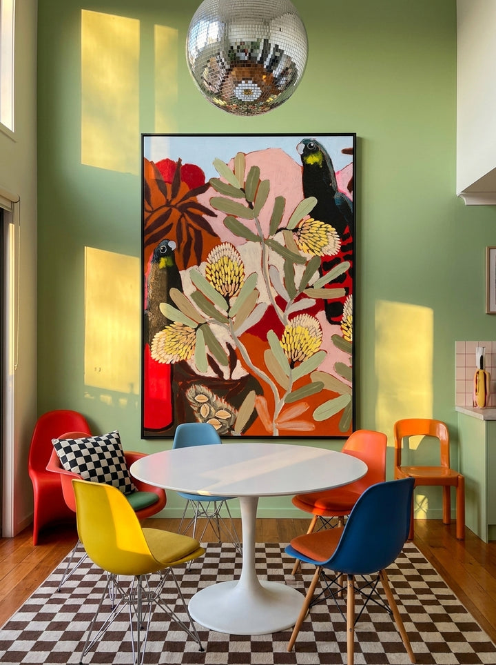 Oversized statement modern wall art print styled on the wall in a colourful eclectic dining room