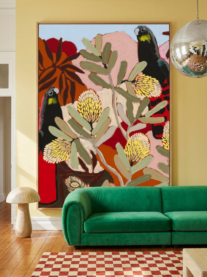 Oversized statement modern wall art print styled on the wall in a colourful eclectic living room