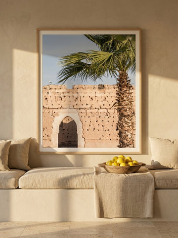 Modern wall art print styled on the wall in a Mediterranean living room