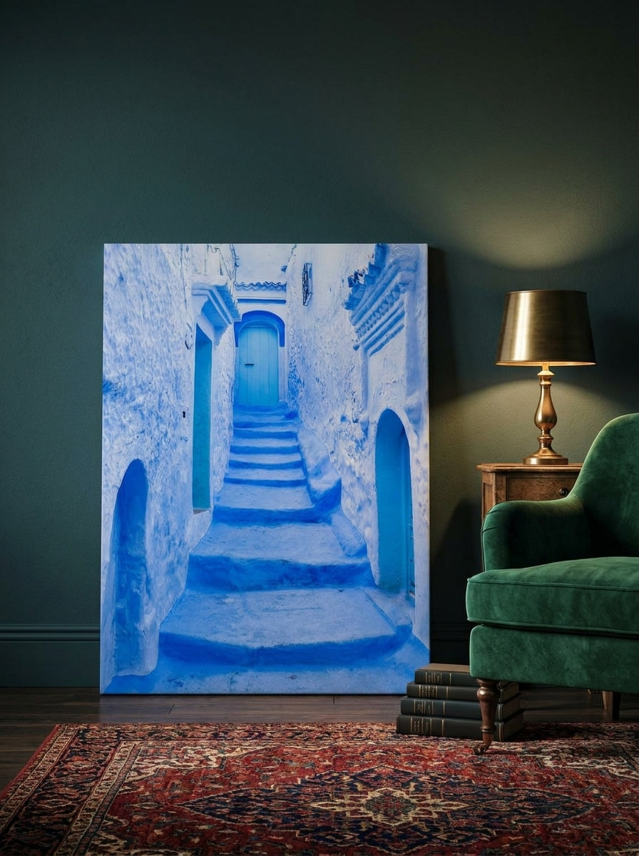 Stretched canvas wall art leaning against the wall in a moody home office