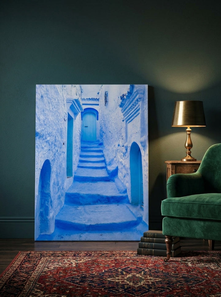 Stretched canvas wall art leaning against the wall in a moody home office