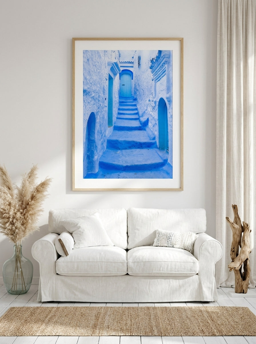 Modern wall art print styled on the wall in a coastal living room
