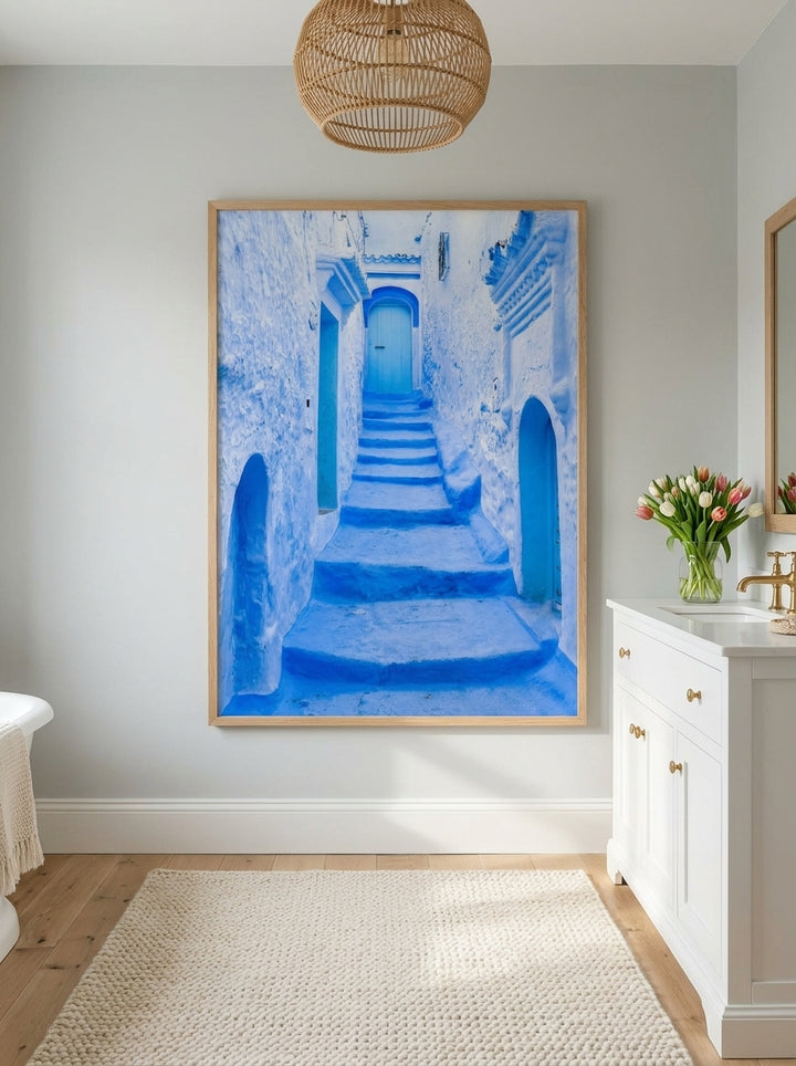 Modern wall art print styled on the wall in a bright Scandinavian bathroom