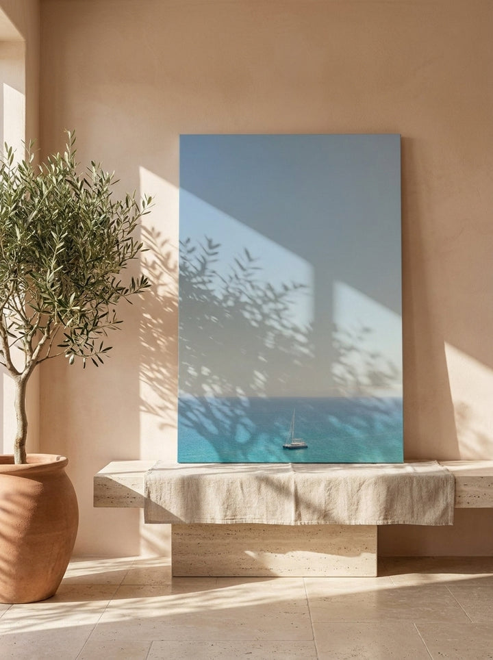Stretched canvas wall art standing on a console in a Mediterranean living room