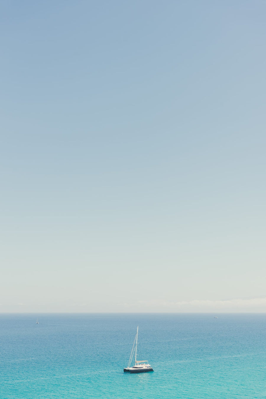 Sailboat on Blue Ocean By Photolovers | Art & Canvas Print