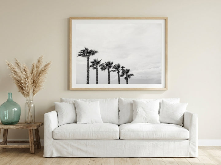 Modern wall art print styled on the wall in a coastal living room