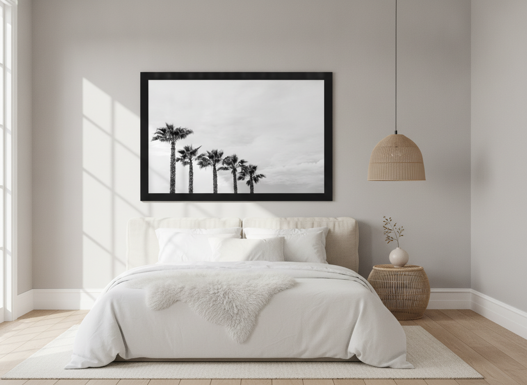 Oversized statement modern wall art print styled on the wall in a bright Scandinavian bedroom