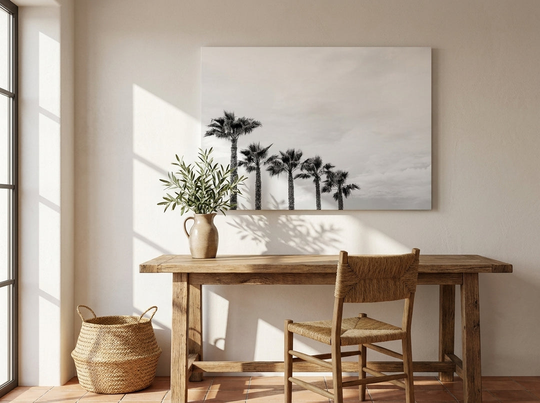 Stretched canvas wall art styled on the wall in a Mediterranean home office