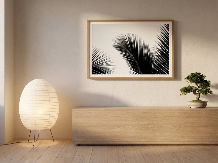 Modern wall art print styled on the wall in a warm Japandi living room