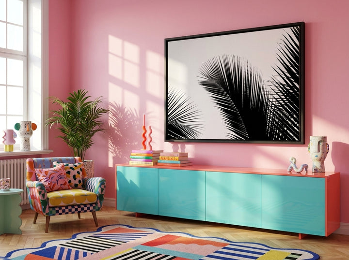 Oversized statement canvas wall art with a black surround styled on the wall in a colourful eclectic living room