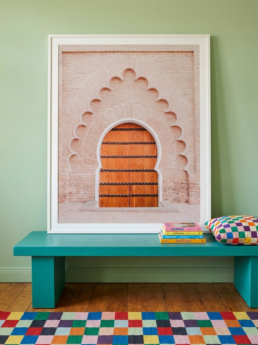 Modern wall art print standing on a side table in a colourful eclectic bedroom