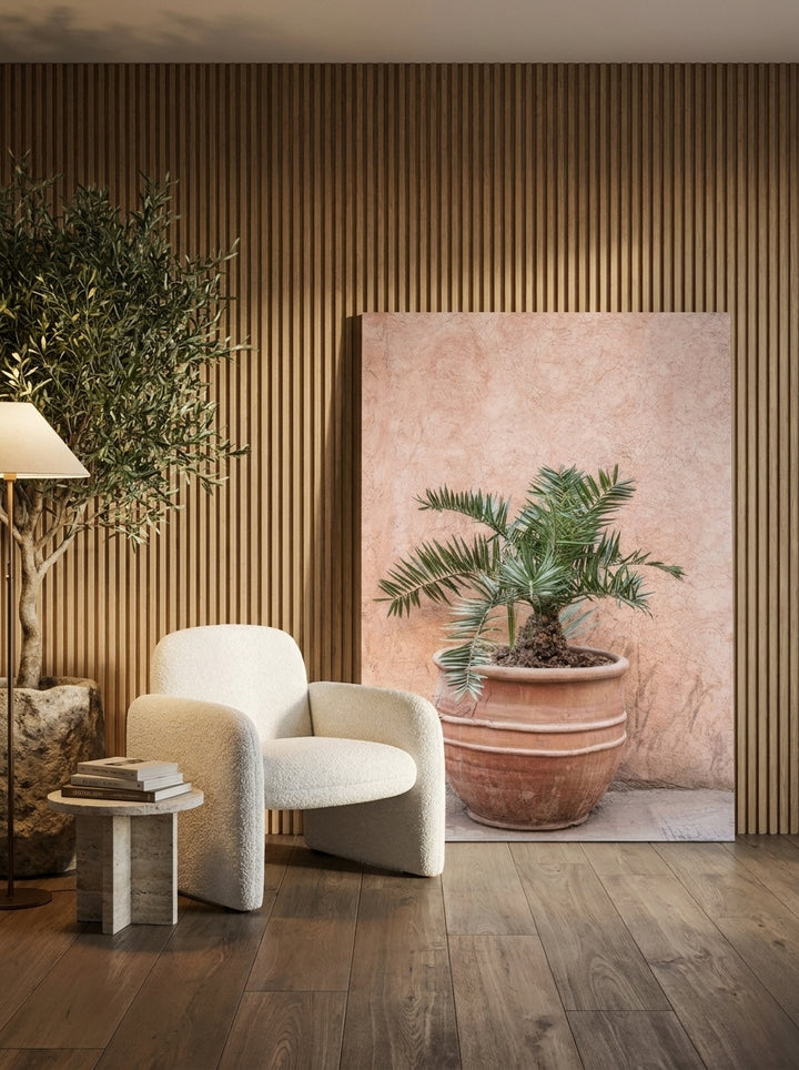 Stretched canvas wall art leaning against the wall in a luxe bedroom