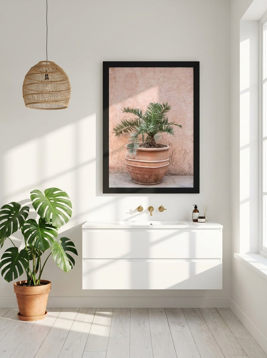 Modern wall art print styled on the wall in a bright Scandinavian bathroom