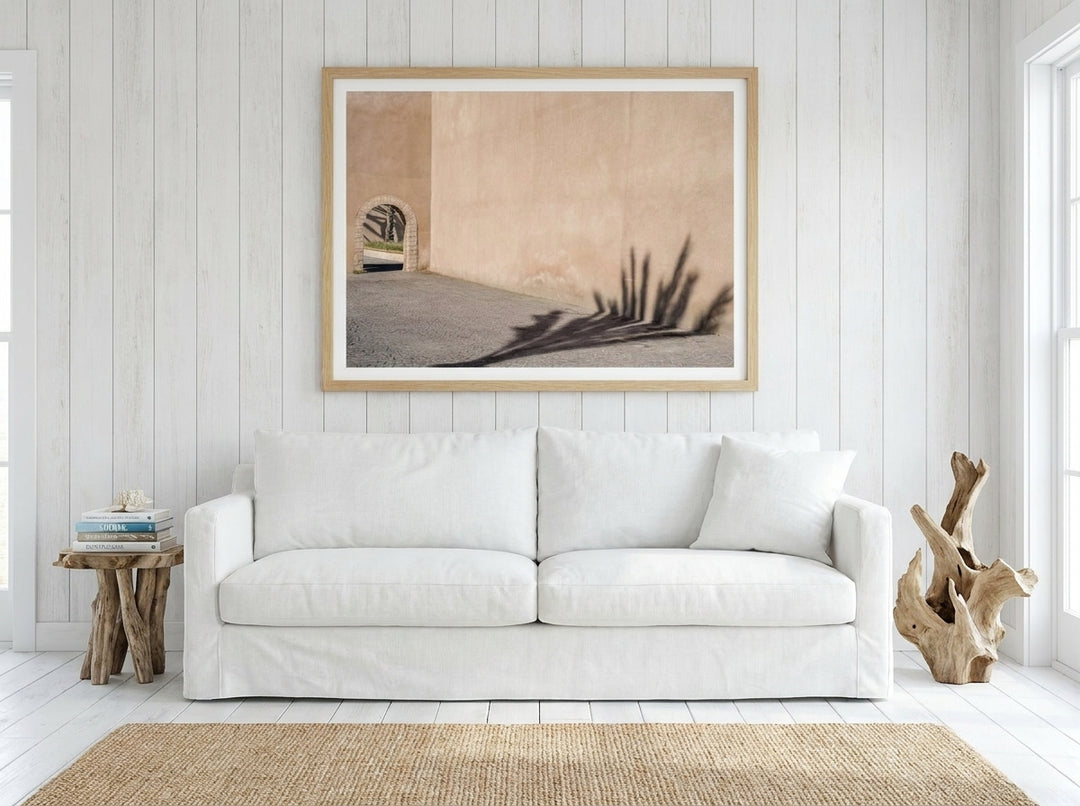 Modern wall art print styled on the wall in a coastal living room