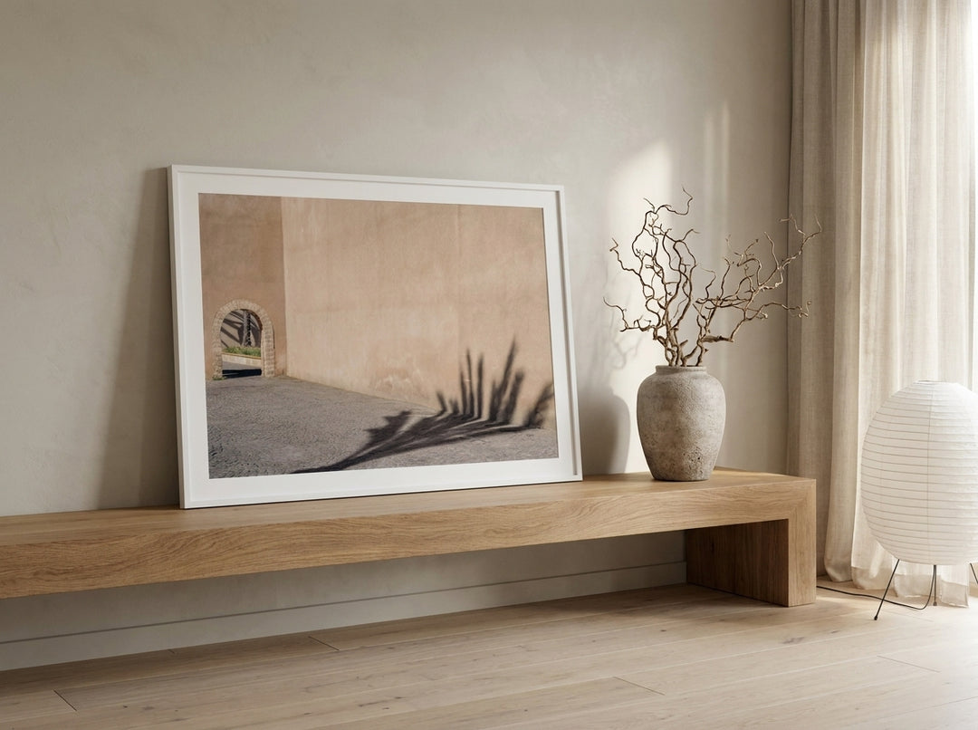Modern wall art print standing on a shelf in a warm Japandi home office