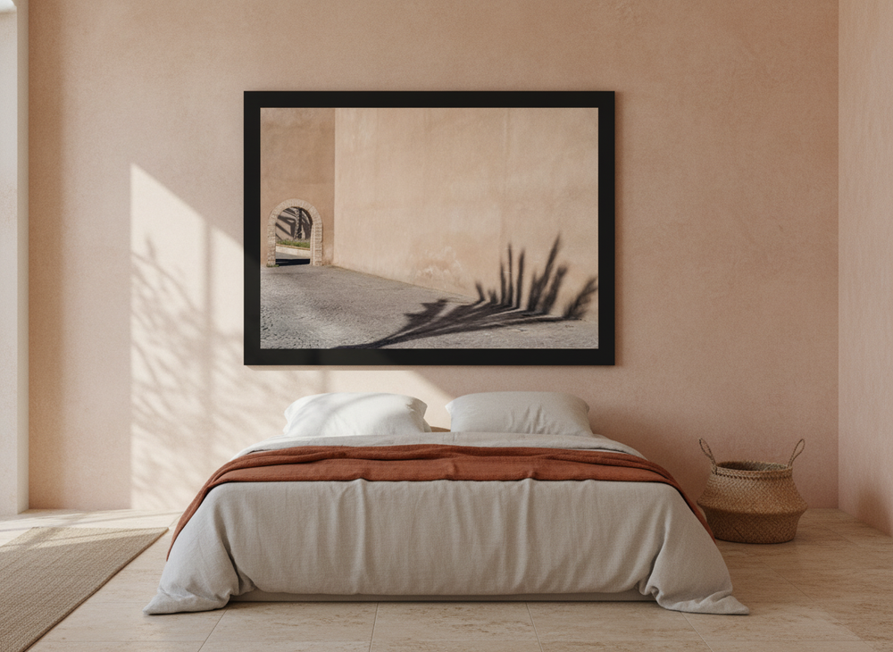 Oversized statement modern wall art print styled on the wall in a Mediterranean bedroom